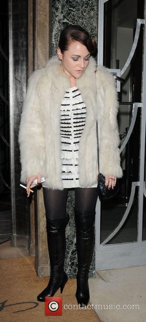 Jamie Winstone smoking a cigarette outside the Dior private dinner, held at Claridges Hotel. London, England - 25.11.10