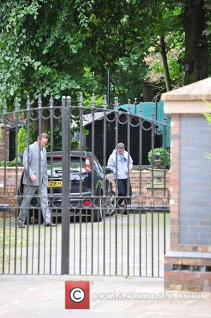 Family members of Coleen Rooney, outside their house. It is rumoured her daughter remains inside the property following revelations about...