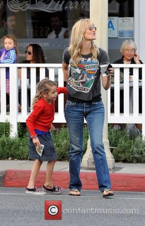 Actress, Laura Dern and her daughter enjoy a family day out in Brentwood Los Angeles, USA - 14.11.10