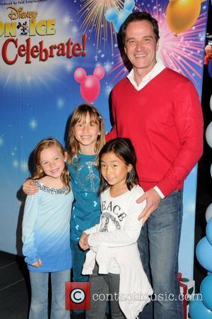 Tim DeKay and his family Disney On Ice presents 'Let's Celebrate!' held at L.A. LIVE.  Los Angeles, California -...
