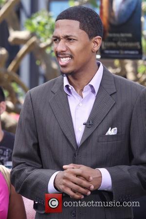 Nick Cannon filming a segment for 'Extra' at The Grove to promote his TV show 'America's Got Talent' Los Angeles,...