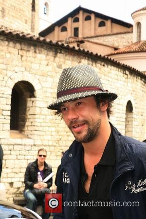 Singer Jay Kay prepares to take part in this year's Italian road race, the 'Mille Miglie', which goes from Brescia...