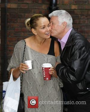Jennifer Ellison gets a kiss from a fan Jennifer Ellison arriving at the the Liverpool Empire Theatre for the opening...