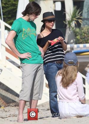 Jim Carrey with daughter Jane Carrey on Malibu Beach Malibu, California - 04.07.10
