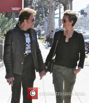 Johnny Hallyday and his wife Laetitia Boudou seen leaving Simoni Plastic Surgery building on La Cienega Los Angeles, California -...