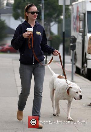 Judy Greer drinking coffee while out walking her dog in West Hollywood. Los Angeles, California - 02.02.10