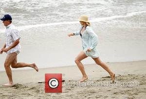 Jenna Elfman and Richard Jenkins filming 'Friends with Benefits' on location at a beach Los Angeles, California - 07.09.10
