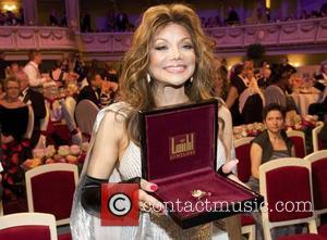 LaToya Jackson  accepts the 'St. George's Great Medal of Gratitude' honouring her late brother Michael Jackson during the opening...