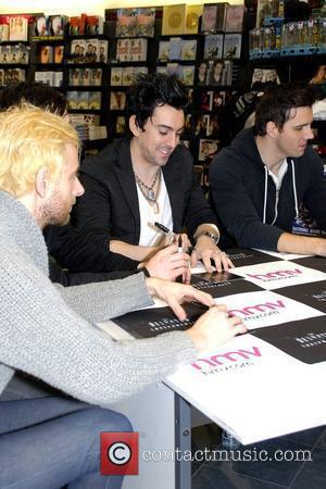 Lee Gaze, Mike Lewis, Ian Watkins, Stuart Richardson and Jamie Oliver Lostprophets sign copies of their new album 'The Betrayed'...