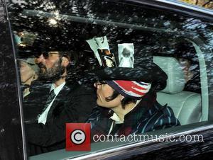 Adam Ant and Andreas Kronthaler leaving the funeral service for the late Malcolm McLaren McLaren, The former Sex Pistols manager...