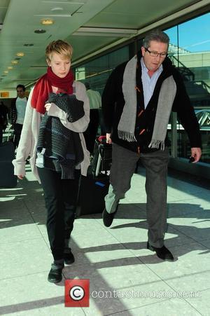 Mia Wasikowska arriving at a London airport London, England - 08.03.10