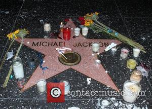 Michael Jackson's star on The Hollywood Walk of Fame on the 1st anniversary of his death Los Angeles, USA -...