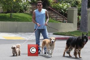 Billy Ray Cyrus walks his dogs near his home in Toluca Lake Los Angeles, USA - 11.07.10