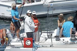 Oprah Winfrey skippers a yacht with Russell Crowe on Sydney Harbour in a regatta raced by Oprah audience members. They...