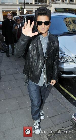 Bruno Mars arriving at the BBC Radio One studios London, England - 19.01.11