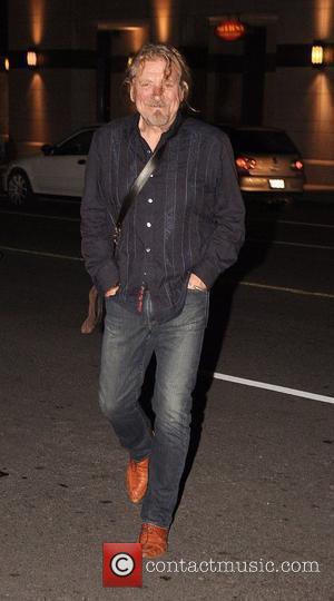 Robert Plant is seen leaving Morton's Steak House and heads back to his hotel Toronto, Canada - 16.09.10