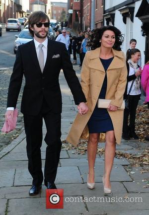 Adam Huckett and Alison King arrives for the wedding of Simon Gregson and Emma Gleave at St Bartholomew's Church...