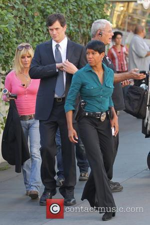 Tom Everett Scott and Regina King on the set of the television show 'Southland' shooting in Hollywood Los Angeles, California...