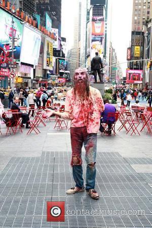 Zombies swarm tourists at Times Square in...