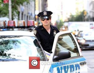 Matt Bomer  Matt Bomer and Willie Garson filming 'White Collar' on location in New York City.  New York,...