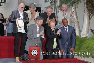 Peter Asher, Phil Everly, Maria Elena Holly and Gary Busey, Tom Lebonge and Leroy Gruber Buddy Holly Star Unveiling On...