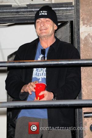 Charlie Sheen addresses his supporters at Massey Hall after the BiPolar Awareness Walk  during the Toronto's stop of his...