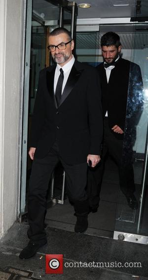 George Michael  leaving the Royal Opera House after performing a charity concert for the Elton John AIDS Foundation's Elizabeth...