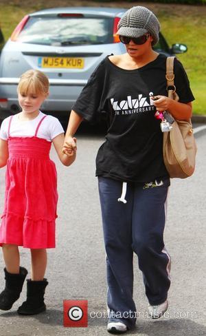 Kerry Katona  leaves her mother's house with her daughter to head for a local hotel to pick up her...