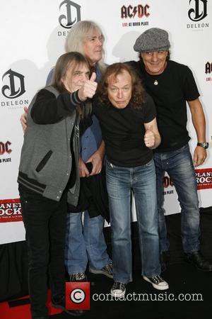 Malcolm Young, Cliff Williams, Angus Young and Brian Johnson of AC/DC  Premiere of 'AC/DC - Live at River Plate'...