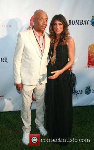 Russell Simmons and Jennifer Esposito  Russell Simmons' 12th Annual Art For Life East Hampton Benefit  New York City,...