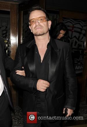 U2 singer Bono leaving Balans in Soho in the early hours of the morning. London, England - 14.09.11