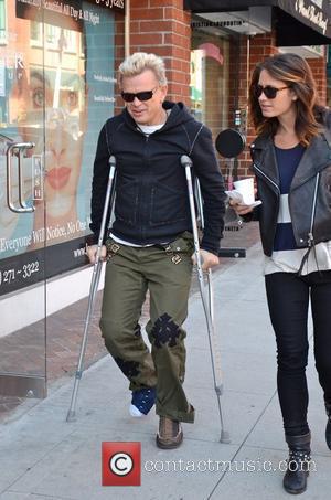 Billy Idol, real name William Broad, leaving a medical centre in Beverly Hills on crutches Los Angeles, California - 07.11.11