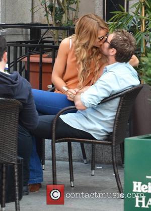 Brian McFadden and Vogue Williams seen kissing outside Harry's Bar where Vogue was filming scenes for the RTE reality show...