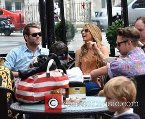Brian McFadden and Vogue Williams outside Harry's Bar where Vogue was filming scenes for the RTE reality show 'Fade Street'...