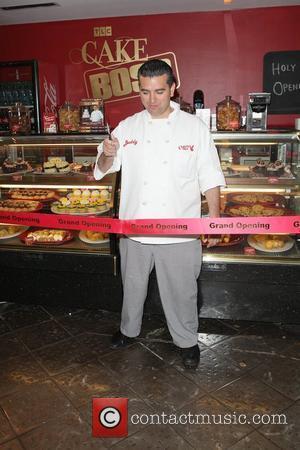 TLC's 'Cake Boss' Buddy Valastro opens the Cake Boss Cafe at Discovery Times Square in NYC with a ribbon cutting...