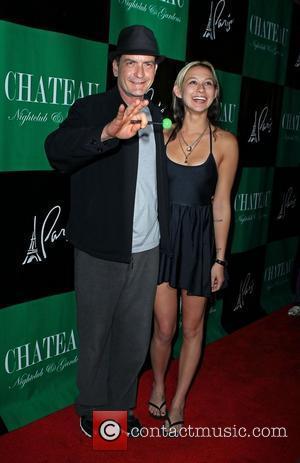 Charlie Sheen and Natalie Kenly Charlie Sheen hosts an evening at Chateau Club and Gardens inside the Paris Hotel and...