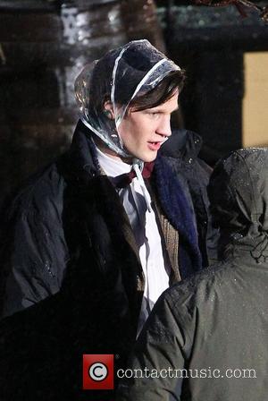 Matt Smith sporting a plastic rain bonnet on the film set of 'Dr Who' in Cornwall. Cornwall, England - 02.02.11