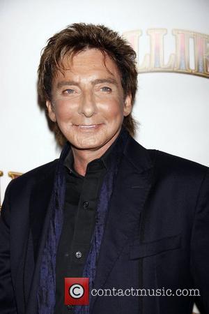 Barry Manilow Opening night of the Broadway musical production of 'Follies' at the Marquis Theatre - Arrivals New York City,...