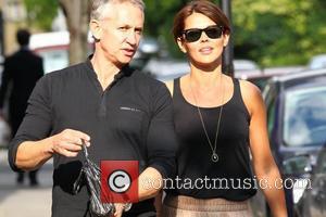 Gary Lineker and wife Danielle Lineker aka Danielle Bux with their Dog out and about in west London. Gary holding...