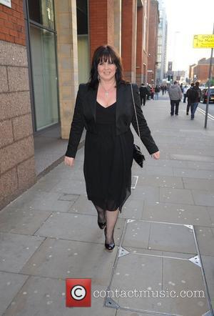 Coleen Nolan smoking a cigarette arrives for the world premiere of 'Ghost' at the Opera house Manchester, England - 12.04.11