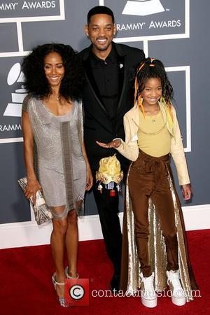 Jada Pinkett Smith, Will Smith and Willow Smith The 53rd Annual GRAMMY Awards at the Staples Center - Red Carpet...