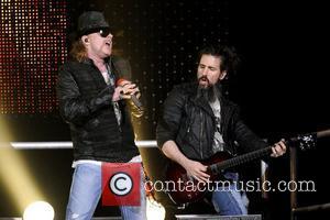 Axl Rose and Ron 'Bumblefoot' Thal Guns N' Roses perform on stage at Copps Coliseum in Hamilton, Ontario. Hamilton, Canada...