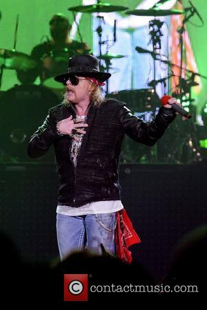 Axl Rose  Guns N' Roses perform on stage at Copps Coliseum in Hamilton, Ontario. Hamilton, Canada - 28.11.11