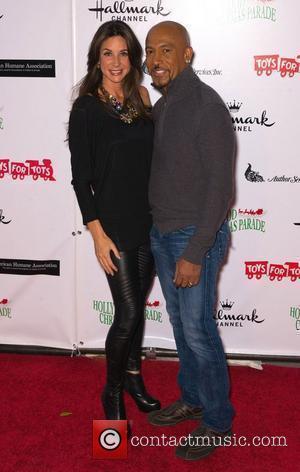 Montel Williams with wife Tarra  The 80th Anniversary of The Hollywood Christmas Parade benefiting Marine Toys For Tots on...