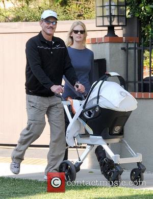 Marvin Jones, Xander Dane Jones and January Jones new mother January Jones walking with her father in Los Feliz, as...