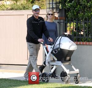 Marvin Jones, Xander Dane Jones and January Jones new mother January Jones walking with her father in Los Feliz, as...