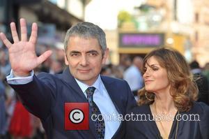 Rowan Atkinson and Lily Atkinson Johnny English - UK film premiere held at the Empire Leicester Square - Arrivals. London,...