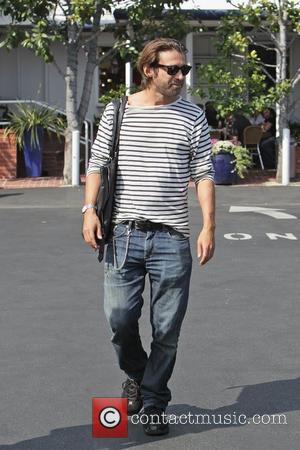 Spanish actor, Jordi Molla in a stripped t-shirt leaving Fred Segal before hosting an art show at the Chateaux Marmont....