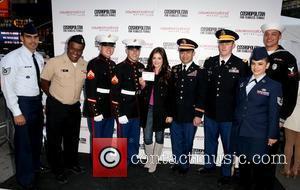U.S. Service Men and Women and Lucy Hale 3rd annual 'Kisses for the Troops' event on Veterans Day, held at...