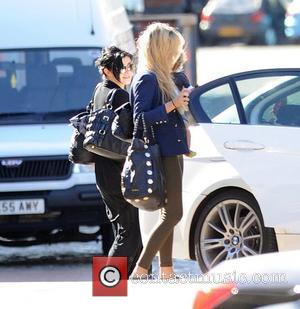 Kym Marsh and her daughter Polly leaving the 'Coronation Street' studios with Charley Webb and her son Buster. Kym hides...
